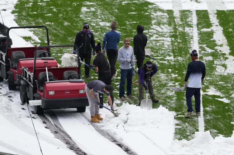 dodgers,-fans-enjoy-snow-day-at-coors-field-in-denver