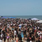 orange-crush-festival-returns-to-tybee-island-as-police-brace-for-50,000-partiers-after-teen-takeover,-gunfire