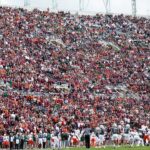 skydiver’s-parachute-gets-stuck-on-scoreboard-at-virginia-tech-spring-game-in-harrowing-scene