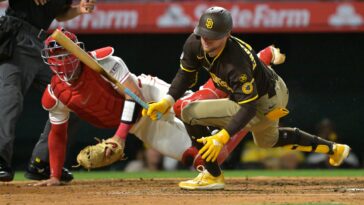 padres-batter-hit-in-face-with-97-mph-pitch-—-and-stays-in-the-game