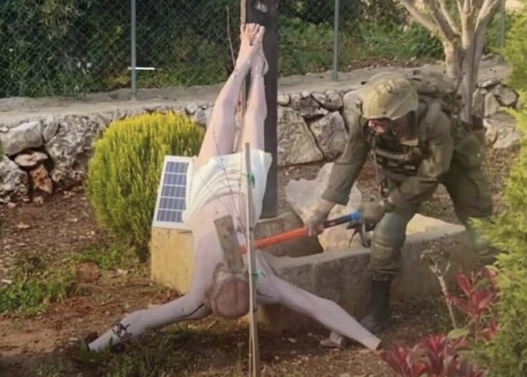 israel’s-military-pledges-investigation-into-photo-of-soldier-smashing-up-a-statue-of-jesus
