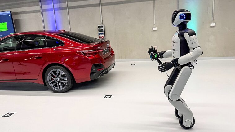 bmw-puts-humanoid-robots-to-work-building-evs