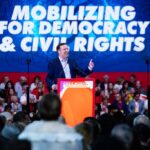 chris-murphy-and-tim-walz-cozy-up-to-wannabe-tyrants-at-communist-rally