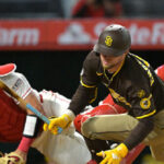 watch:-padres-slugger-hit-in-the-face-with-97-mph-fastball,-stays-in-game