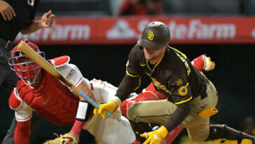 watch:-padres-slugger-hit-in-the-face-with-97-mph-fastball,-stays-in-game