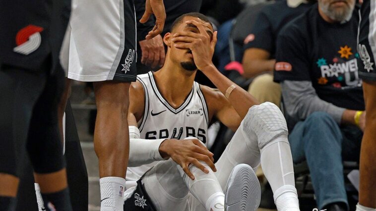 spurs-star-victor-wembanyama-enters-concussion-protocol,-ruled-out-of-game-2-after-fall-against-trail-blazers