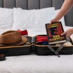 man-packs-book-for-vacation-so-he-can-carry-around-book-on-vacation