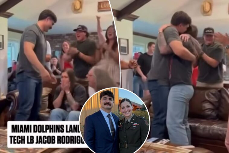 dolphins-pick-shares-hug-with-army-black-hawk-pilot-wife-in-emotional-nfl-draft-moment