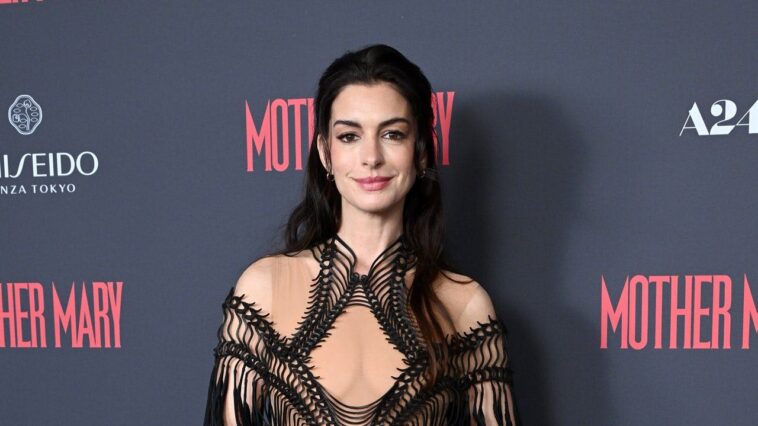 anne-hathaway-stuns-in-daring-sheer-gown-at-london-premiere