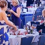 woman-seen-snatching-wine-bottles-during-chaos-after-white-house-correspondents’-dinner-shooting