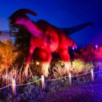 lightning-strike-turns-100-foot-dinosaur-into-raging-fireball,-stunning-onlookers