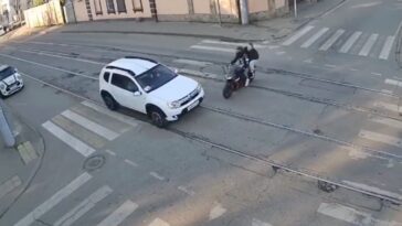 horrific-moment-motorcycle-smashes-into-car,-killing-rider-and-seriously-injuring-passenger