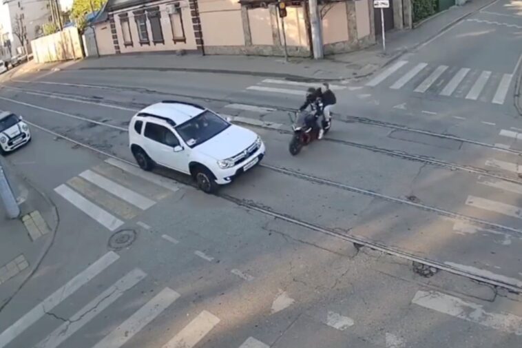 horrific-moment-motorcycle-smashes-into-car,-killing-rider-and-seriously-injuring-passenger