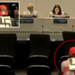 swastika-wearing-agitator-makes-profane-gestures-at-lapd-officials