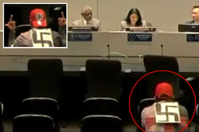 swastika-wearing-agitator-makes-profane-gestures-at-lapd-officials