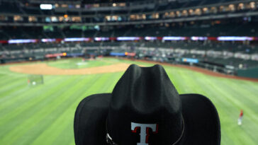 watch:-yankees-fan-beaten-by-rangers-fans,-girlfriend-thrown-down-steps