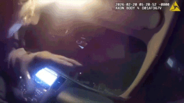 body-camera-video-shows-police-officer-allegedly-kidnapped-by-armed-robbery-suspect-in-roadside-showdown
