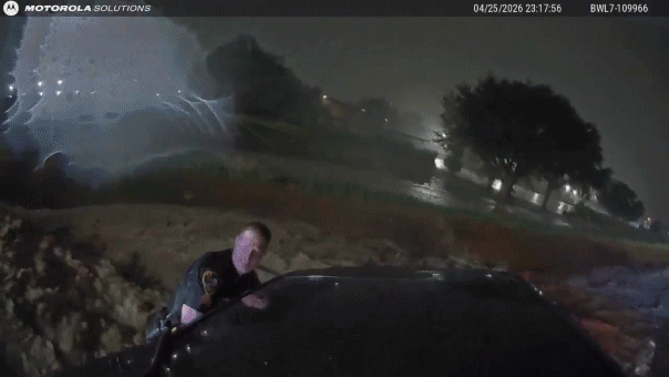 heart-stopping-video-shows-officers-use-unlikely-tool-to-save-family-trapped-in-floodwaters