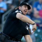 athletics-coach-ejected-after-royals-pitcher’s-broken-chain-leads-to-quick-pitch-controversy