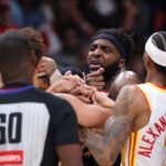 two-players-ejected-after-scrum-amid-knicks’-50-point-lead-against-hawks-sends-referee-crashing-to-the-court