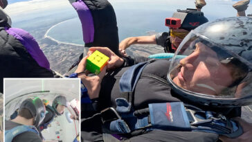 man-solves-rubik’s-cube-in-23-seconds-while-skydiving-to-win-world-record