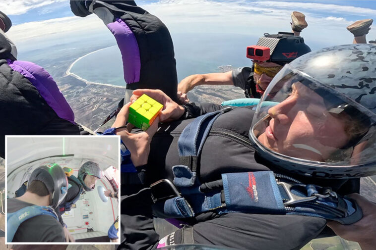 man-solves-rubik’s-cube-in-23-seconds-while-skydiving-to-win-world-record