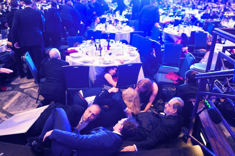 the-jarring-photo-that-captured-‘petrified’-dinner-guests-fearing-reprise-of-kennedy-curse