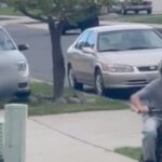 crazed-female-driver-swerves-onto-sidewalk-and-allegedly-tries-to-mow-down-kid-riding-his-bike-–-then-she-offers-a-wild-excuse-for-her-actions-(video)