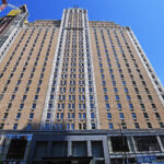 famed-nyc-hotel-reopens,-shedding-migrant-shelter-past-for-times-square-tourists