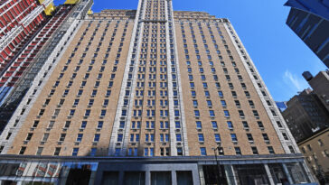 famed-nyc-hotel-reopens,-shedding-migrant-shelter-past-for-times-square-tourists