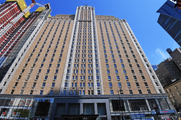 famed-nyc-hotel-reopens,-shedding-migrant-shelter-past-for-times-square-tourists