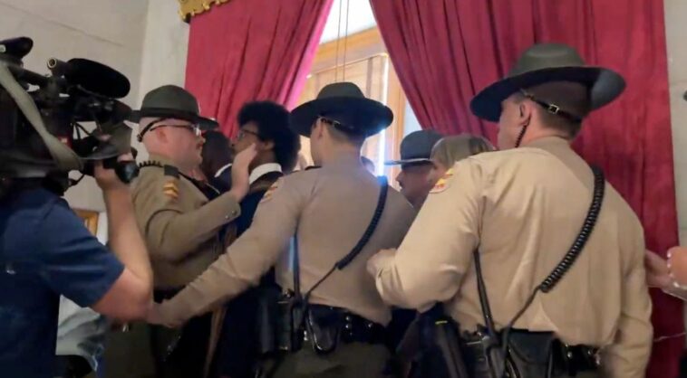 watch:-democrat-shoves-state-trooper,-screams-in-his-face-as-redistricting-protest-turns-ugly
