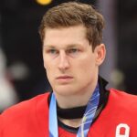 is-avalanche-star-nathan-mackinnon-a-psychopath-for-wearing-flippers-and-goggles-in-the-hotel-pool?