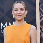 kate-hudson-turns-heads-in-bold-yellow-dress-with-revealing-cutouts-while-on-the-red-carpet