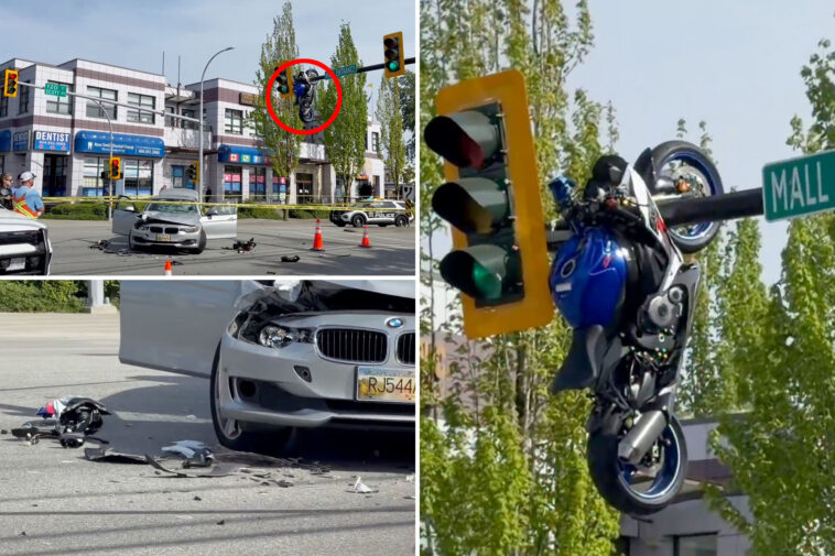 motorcycle-flies-onto-traffic-light-pole-after-head-on-collision-with bmw,-wild-video-shows 