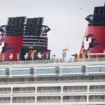 disney-abruptly-cancels-cruise-and-boots-passengers-off-ship,-leaving-them-stranded