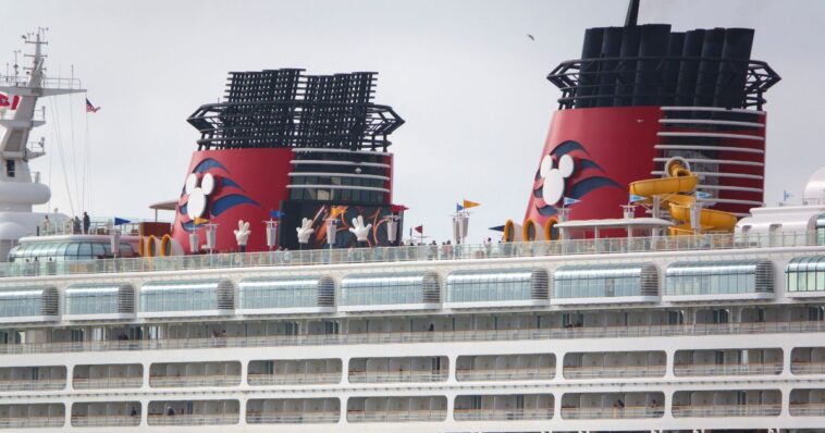 disney-abruptly-cancels-cruise-and-boots-passengers-off-ship,-leaving-them-stranded