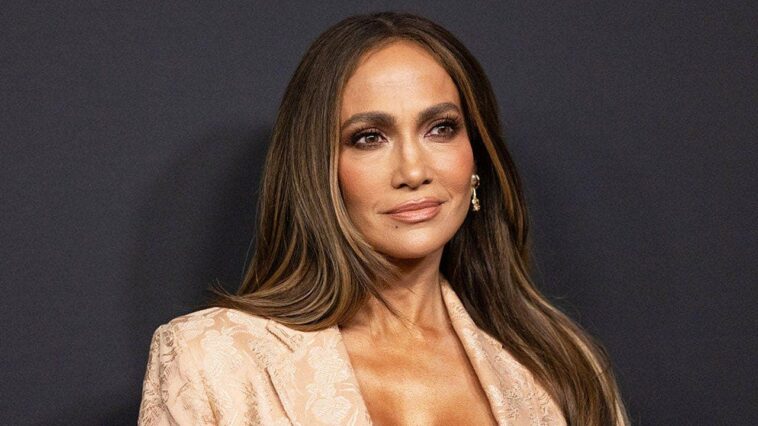jennifer-lopez’s-dress-holds-on-for-dear-life-at-her-netflix-event,-trump-powers-through-some-wine-&-kay-adams