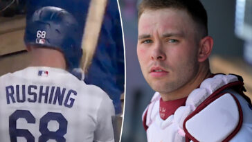 dodgers-catcher-dalton-rushing-beats-himself-with-bat-during-wild-dugout-outburst