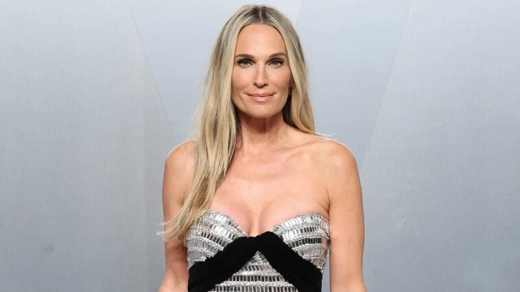 molly-sims-turns-heads-in-orange-bikini-for-sports-illustrated-swimsuit-issue