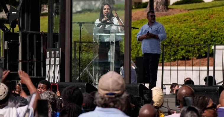 video:-aoc-wheels-out-political-prop-we’ve-never-seen-before-–-a-bulletproof-barrier,-but-there’s-a-giant-problem