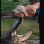 see-it:-she-kissed-a-14-foot-alligator-for-graduation-photos