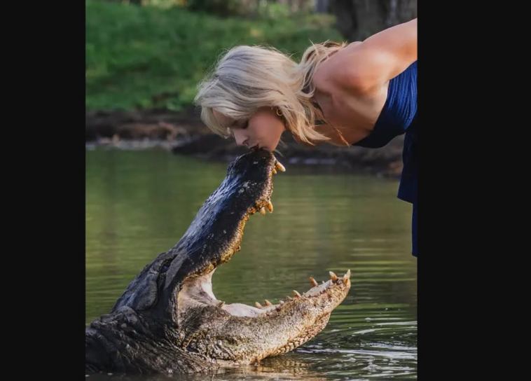 see-it:-she-kissed-a-14-foot-alligator-for-graduation-photos
