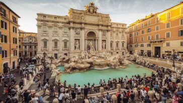tourist-takes-forbidden-plunge-at-iconic-landmark-as-visitors-watch,-stunned