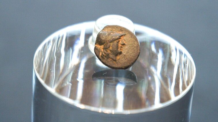 teen-stumbles-on-mysterious-coin-from-legendary-city,-puzzling-archaeologists-over-its-journey