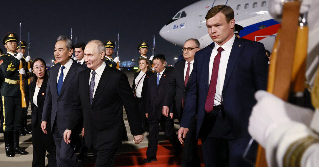 china-gives-visiting-vladimir-putin-the-red-carpet-treatment-days-after-trump-trip