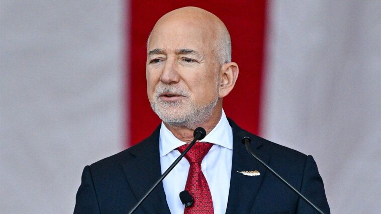 jeff-bezos-confronted-on-washington-post-layoffs,-argues-paper-must-be-profitable-regardless-of-his-wealth