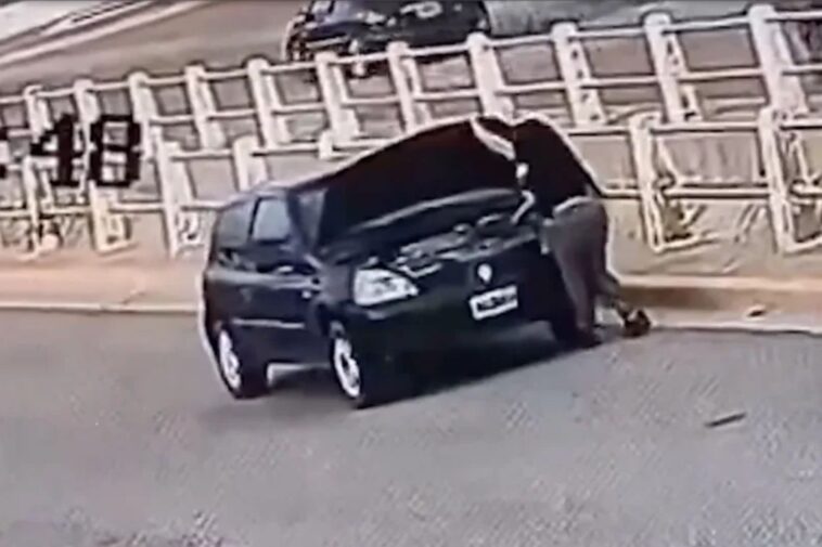 horrifying-moment-driver-run-over-by-her-own-car-while-checking-battery-—-and-miraculously-survives-unscathed
