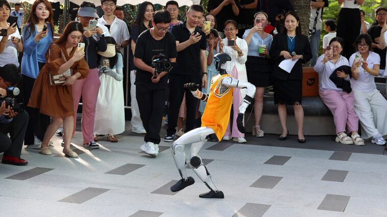 robot’s-lifeless-corpse-hauled-off-stage-after-fall-during-disastrous-michael-jackson-impression