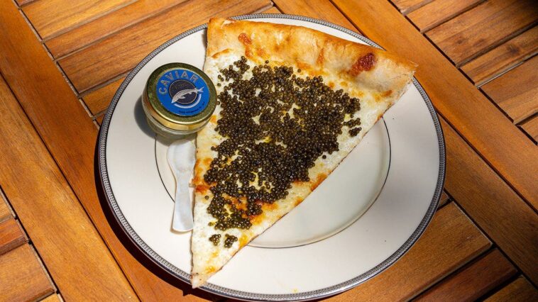 philadelphia-pizza-shop-sells-$55-slices-topped-with-caviar,-served-on-gold-plate-with-keepsake-spoon
